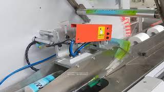 Toilet paper cutting machine with packing machine