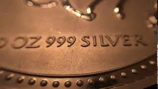 60 fps 4k 10oz Silver Coin Close Up Pan