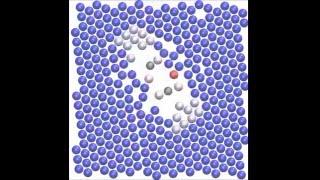 Elasticity-induced force reversal between active spinning particles in dense passive media