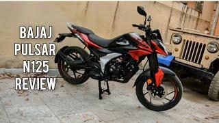 Bajaj Pulsar N125 REVIEW: Vibrations Performance Handling Ride Quality Mileage Price Seat Open Clock