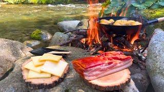 Swiss raclette prepared by a Swiss man with Swiss cheese in Switzerland