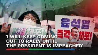 Thousands brave freezing weather in Seoul to rally for and against arresting impeached president