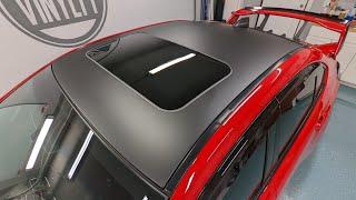 Hexis deep black satin Vinyl wrap on roof of Subaru WRX STI