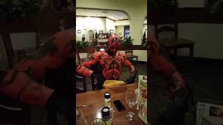 Darth Maul getting ready to eat at Olive Garden