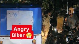 Huge argument breaks out between biker and auto driver