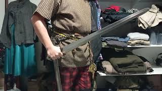 Sword attachment system with armored belt.