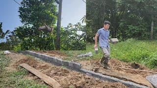 Build a fence between the two lots and complete the foundation.