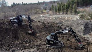 what's cooler than owning one black excavator?...owning TWO!