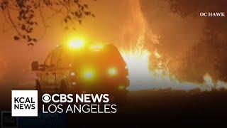 Thousands of firefighters continue to battle trio of wildfires burning in Southern California