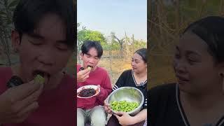 My brother eating sour bilimbi with shrimp paste #fruit #cookingrecipes #food #cookingideas