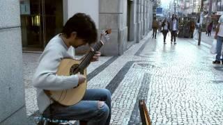 Street Player of Portuguese Guitar in Porto, Portugal