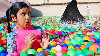 Ellie & Charlotte Ball Pit Shark Surprise in the Swimming Pool