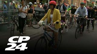 Mayor-elect Olivia chow bikes to city hall ahead of swearing in