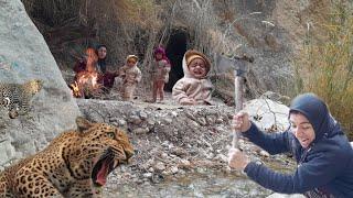 Heavy rain, water entering Khadija's hut, and a leopard attacking Khadija and the children