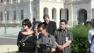 Tony Choi speaks about his family's situation at the May 25 immigration press conference