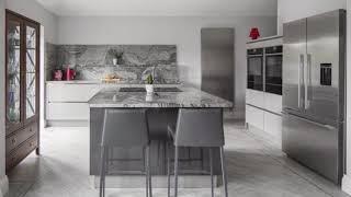 Grey Handleless Kitchen With Grain Matched Granite Worktops