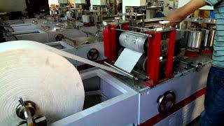 How to operate a napkin paper making machine Napkin paper folding machine testing run