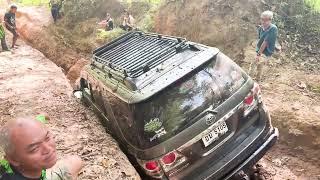 Off-Road Driver Powers Through Muddy Ditch