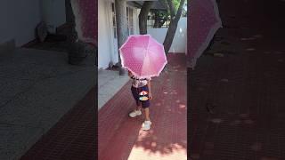 Small umbrella big umbrella #shorts #funny #nitya #comedy #cute #fun #umbrella #pink #happy