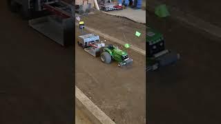 Tractor Pulling with a remote control toy John Deere tractor