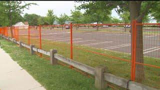 Milford city installs fence to control crowding at Walnut Beach