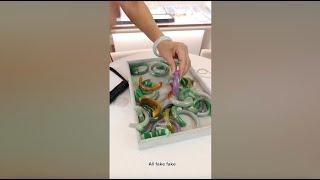 Why is she BREAKING all these JADE BRACELETS??!! Don't wear treated and dyed jade !