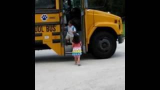 Hailey greeting Carson off the bus