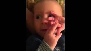 Reuben chewing on his hands