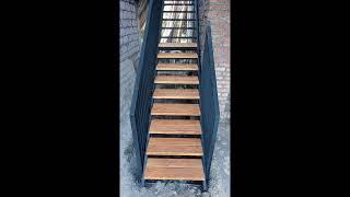 Modern stairs made of metal and wood