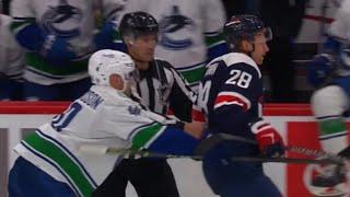 Elias Pettersson Helps Opponent Connor Brown To Bench