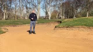 Golfers raking bunkers - how to?