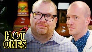 Superfan Brett Baker Grills Sean Evans Over Spicy Wings | Hot Ones