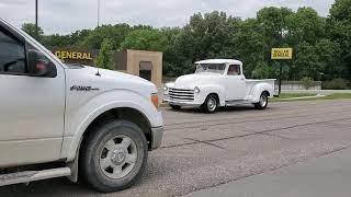 Corona Cruz cars leaving a gas station in Hickman, Nebraska