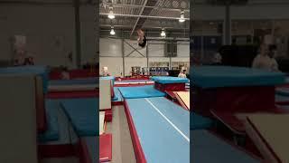 Quad twist on tumble to hard landing