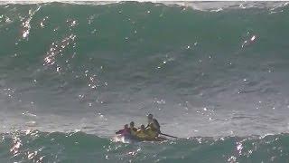 Extreme surfboat rowing in lifesaver relay Kurrawa Beach 2011