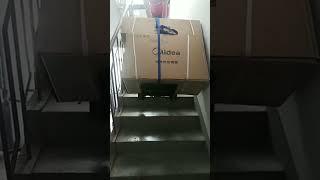 Using electric stair climber to move heavy materials upstairs easily. #handtruck #dolly