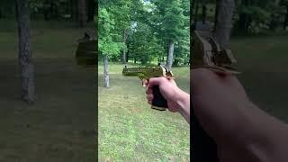 Shooting deadpool’s gold desert eagle .50 AE