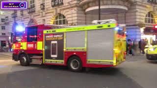 Ambulance and Fire Brigade Going Through Piccadilly Circus, London