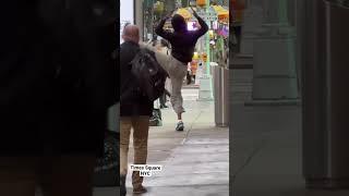 Charged Up in Times Square: Unidentified Man Creates Choreo as he Charges Phone at Kiosk #Shorts30