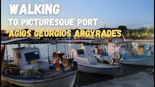 Walking to picturesque port of Agios Georgios South argirades (Golden hour)
