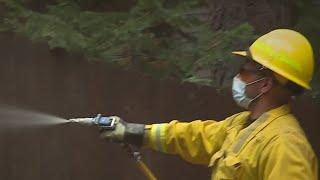 Homeowners In The Sierra Having Their Properties Sprayed With Special Fire Retardant