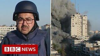 Israel-Gaza: Strike collapses building during live BBC report - BBC News