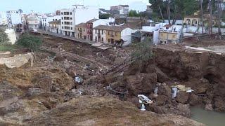 Residents of Valencian town of Chiva assess damage, collect bottled water