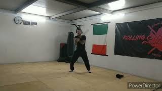 Kombatan Karenza with hand strikes and kicks