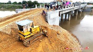 Fantastic job! Best Dozer pushing soil And dump trucks dumping soil filling bridge connection road