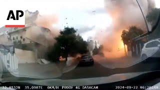 Car camera shows Hezbollah rocket hit in northern Israel