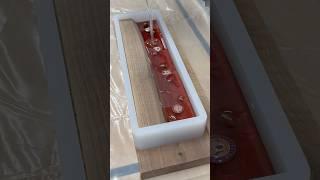 Sealing in the details with a crystal-clear epoxy pour—watch this shine!