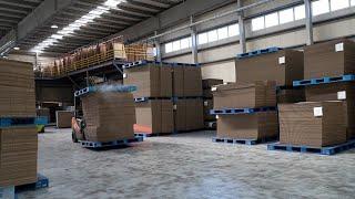 The process of making cardboard boxes. Korean box factory