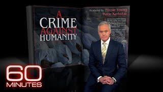 From the 60 Minutes Archive: A Crime Against Humanity