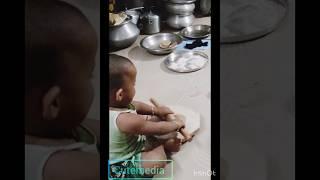 Rooti making by cute baby #shorts #cute #roti